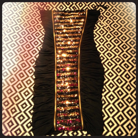 Sexy little black dress with sparkles and zippers