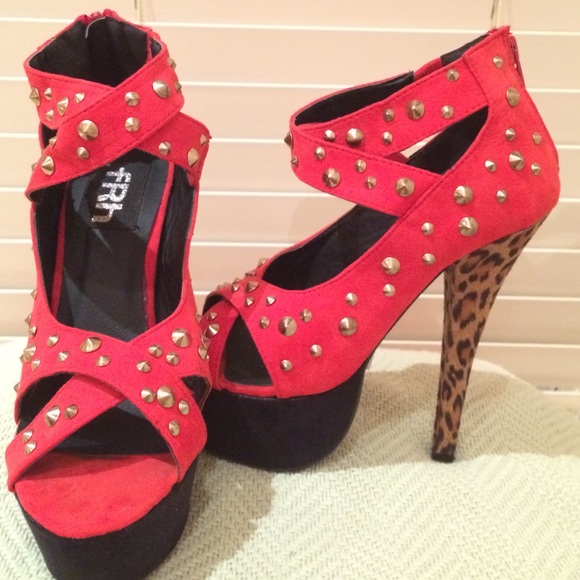 Turn heads in these studded red pumps