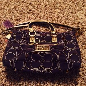 Small authentic purple and gold coach purse
