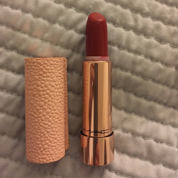 Making pretty LE Mac lipstick in Runaway Red