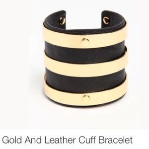 Black-gold leather trendy cuff.