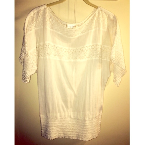 White lacy blouse.