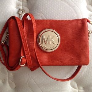 Michael Kors burnt orange clutch