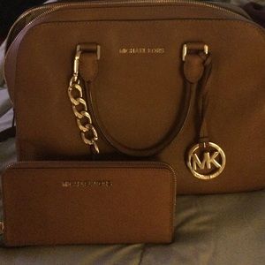 Authentic Michael kors purse and matching wallet