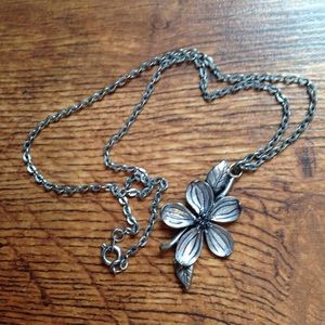 Pewter colored necklace with floral pendant