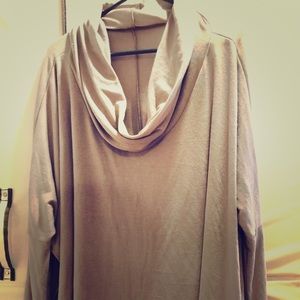Long sleeved cape/sweater, brand new without tags