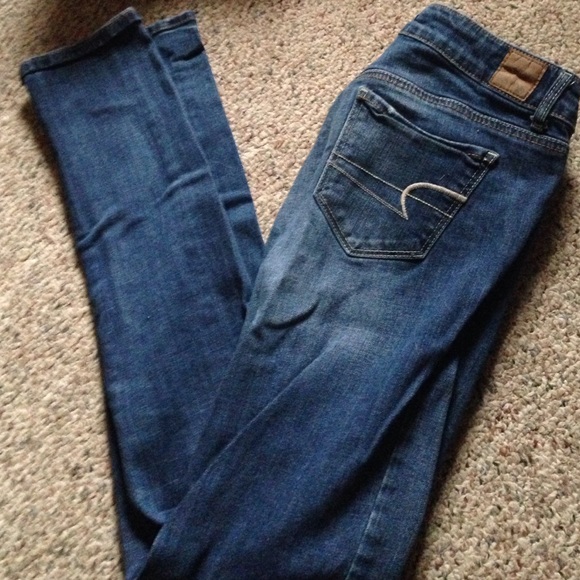 Long dark wash skinny jeans