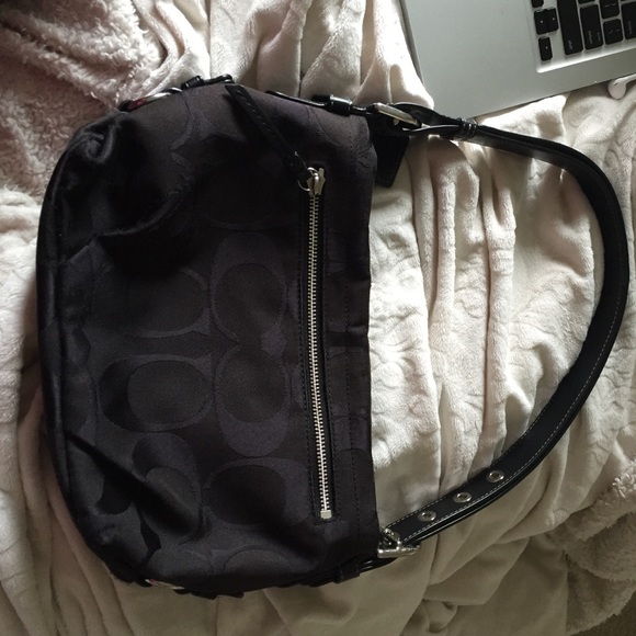 Small black coach purse and matching wallet