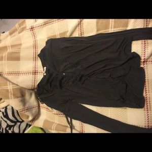 Black/grey long sleeve shirt.