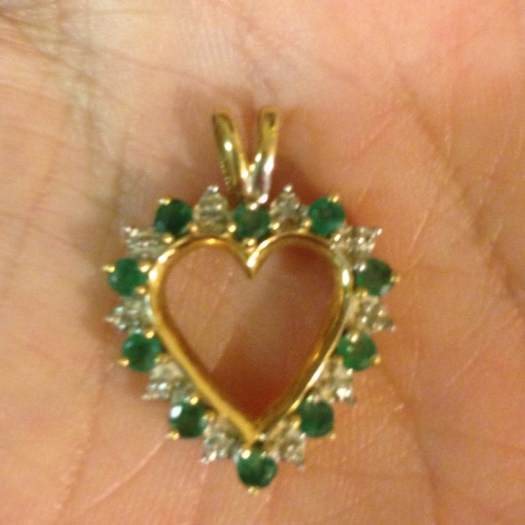 Emerald/diamond chip 10k gold pendant.