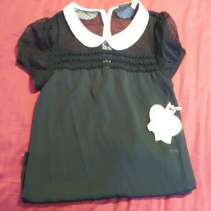 Black blouse, white collar