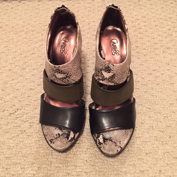 Carlos Santana strappy heels.