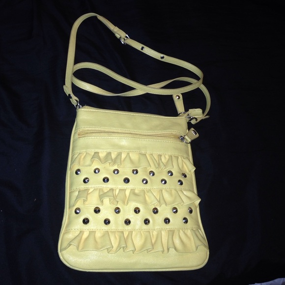 Cute, yellow, cross body purse.