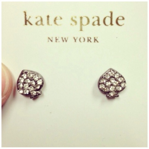 KATE SPADE Silver Signature Spade Stud earrings.