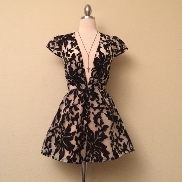 Urban Outfitters Dresses & Skirts - UO Cameo Black/White Floral Operator Romper XS NWT