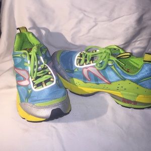 Newton running shoes. Turquoise, yellow, and green