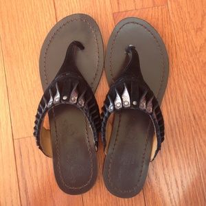 Black Nine West flip flops