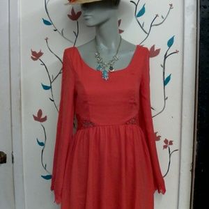 Coral dress w/crochet cuts and long sleeves