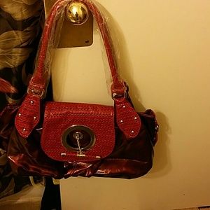 ?Red or platinum ?hand bags