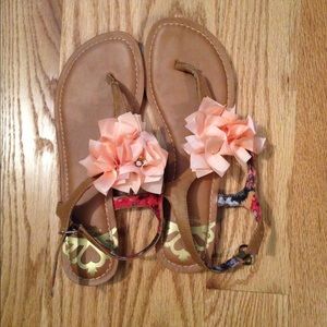 Tan sandals with coral flowers