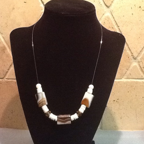 Natural colored floating necklace with with accent