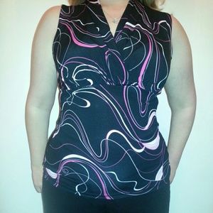 Beautifully colored form fitting sleeveless blouse