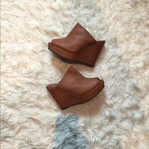 Brown slip on wedges