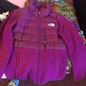 A purple north face jacket