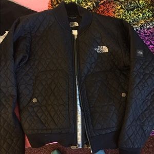 A black north face jacket