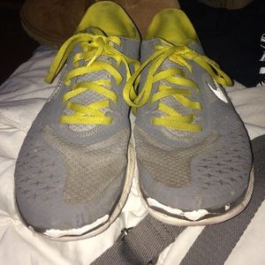 Grey & yellow nikes