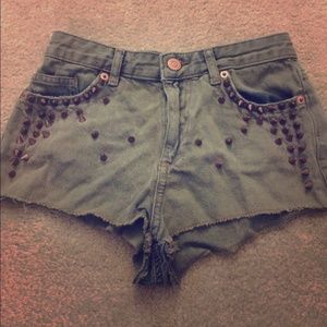 Denim shorts with spikes