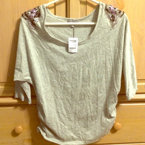 BRAND NEW. Grey shirt with beads on shoulders.