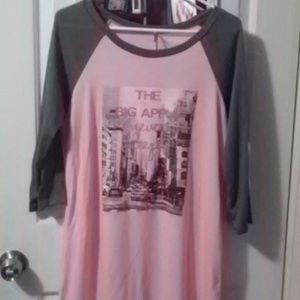 night shirt says on it, the big Apple never sleeps