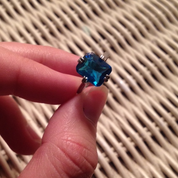 Silver ring with a blue stone