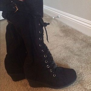 Black boots with a short wedge