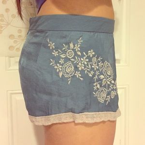 Blue silk shorts with lace and floral embroidered