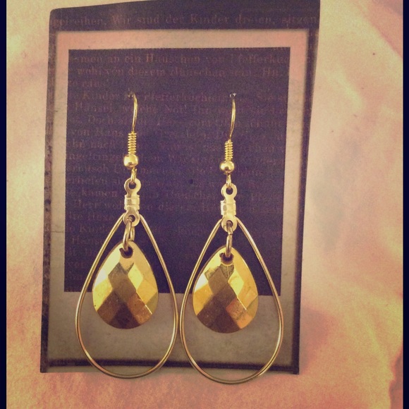 New gold colored dangle earrings