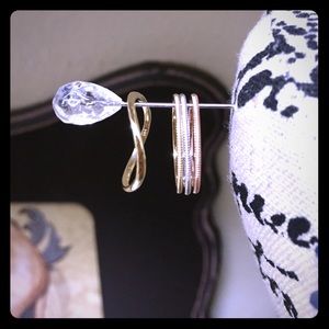 3 1mm gold coin edge and 1 Ariel Gordon gold bands