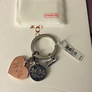 Authentic COACH key chain with box and dust bag.