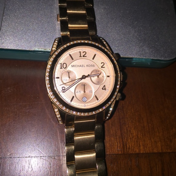 MK rose gold watch