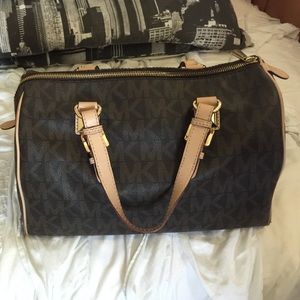 Michael Kors Brown Cylindrical Monogram Purse