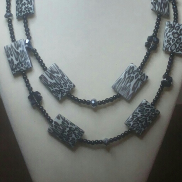 This necklace 37 inches long doubled for the style
