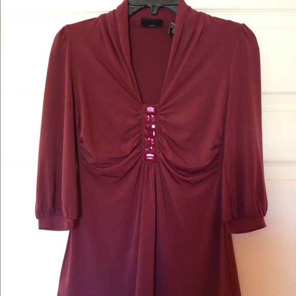 Wine colored top with gems NWOT