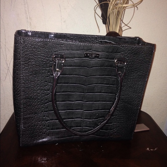 A medium size Kate Spade bag, glossy grey