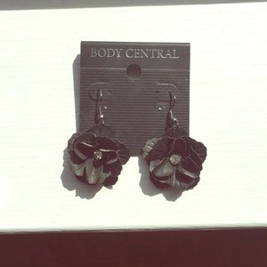 Black flower hang down earrings