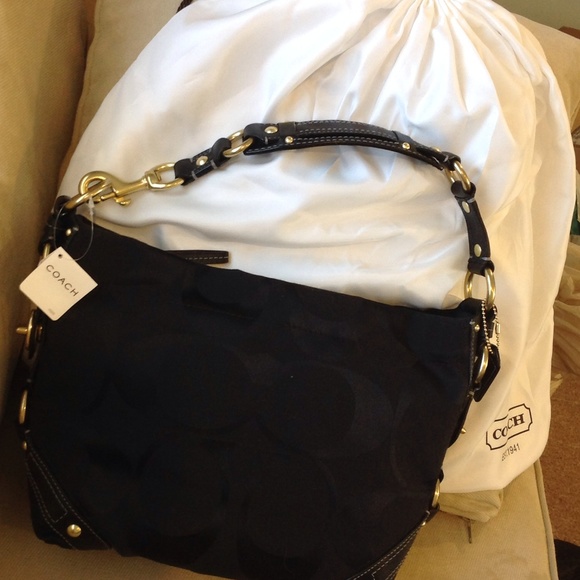 NWT Black on black signature coach Carly bag!