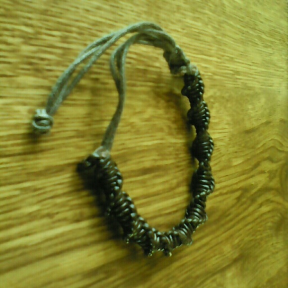 Leather and string bracelet
