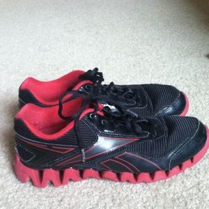 Red and black reeboks