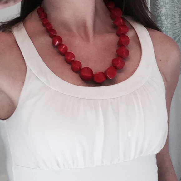 Red chunky necklace easily add color to any outfit