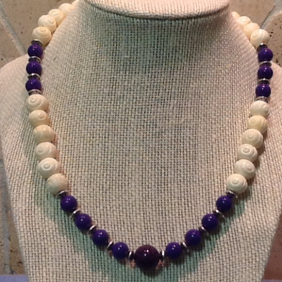 Dark purple necklace with white and silver accents